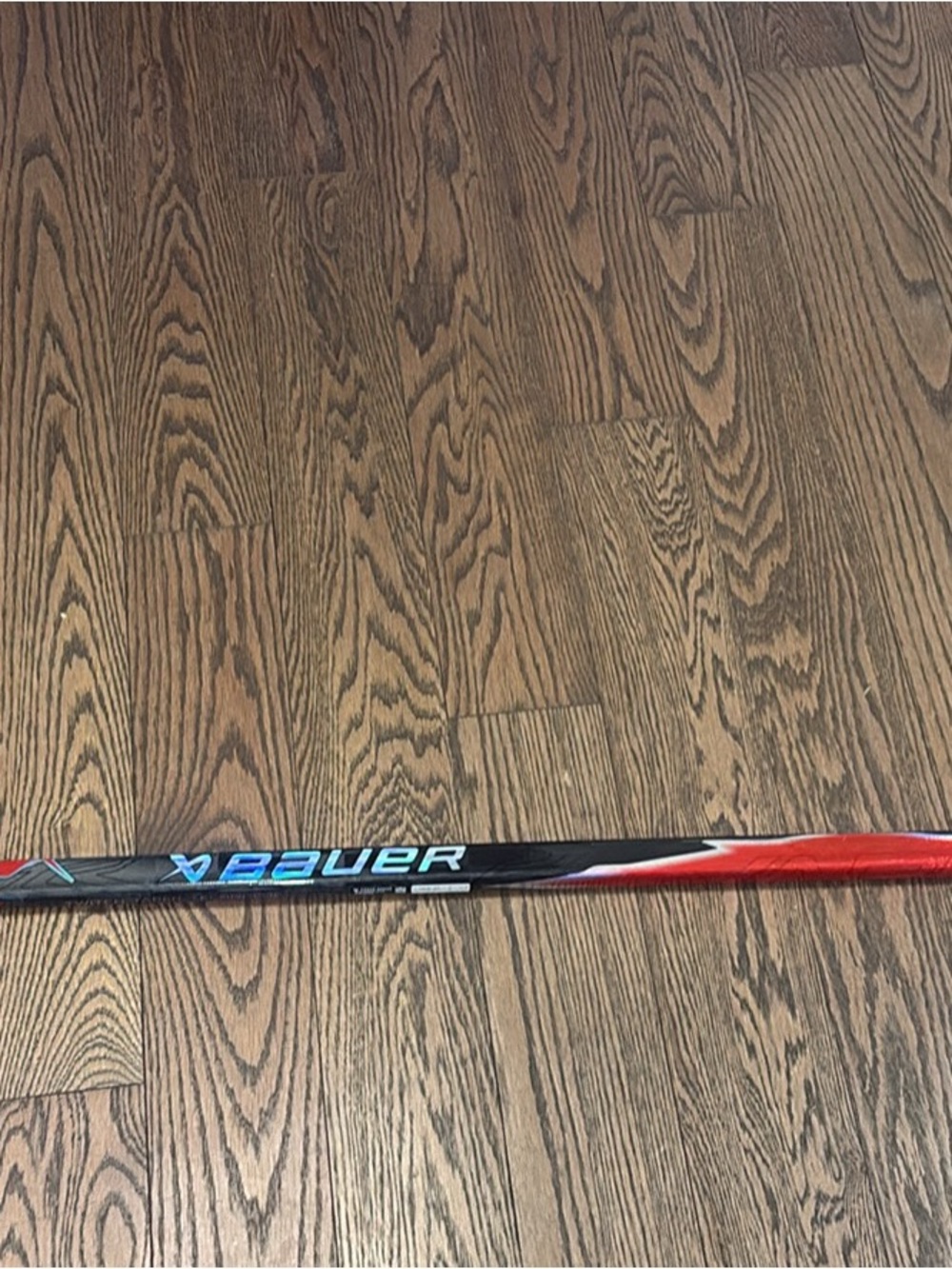 Custom red Bauer flylite p28 55 flex left hand